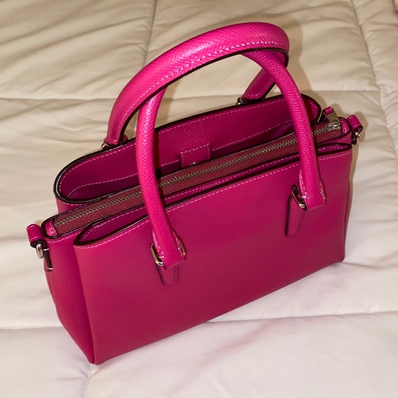 pink coach slides and purse